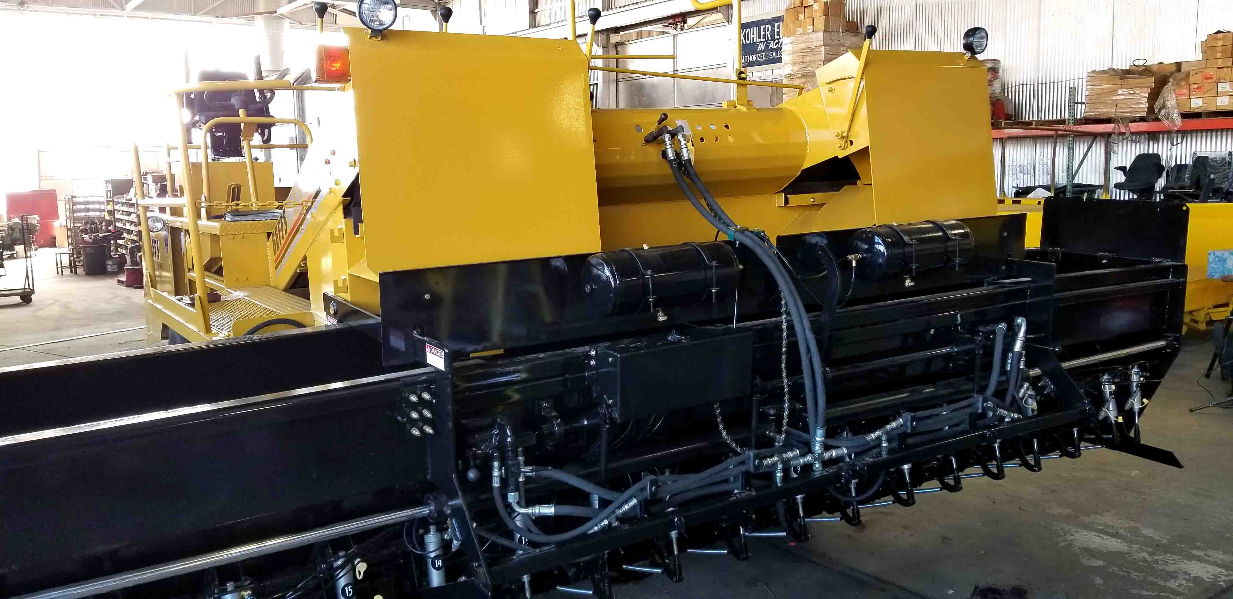 image of used chip spreader yellow with expandable hopper